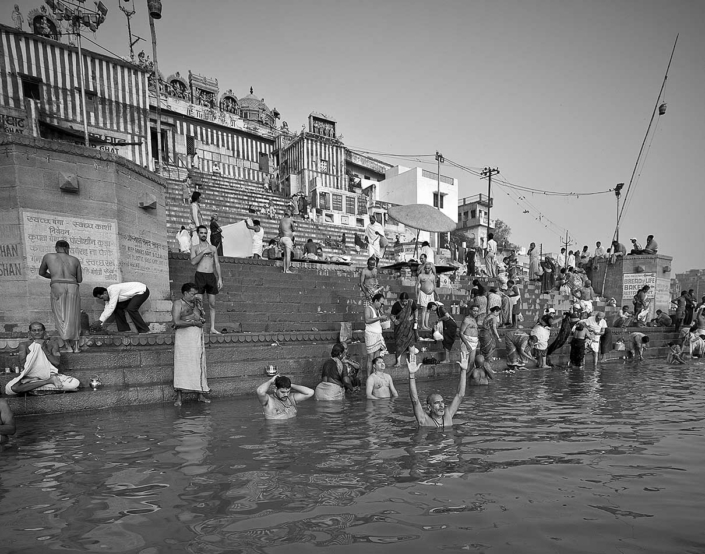 Believers take a Dip in the Ganges River Varanasi India